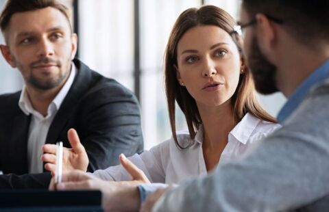people in a serious meeting