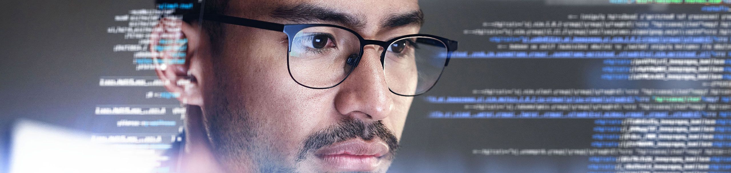 man looking at code